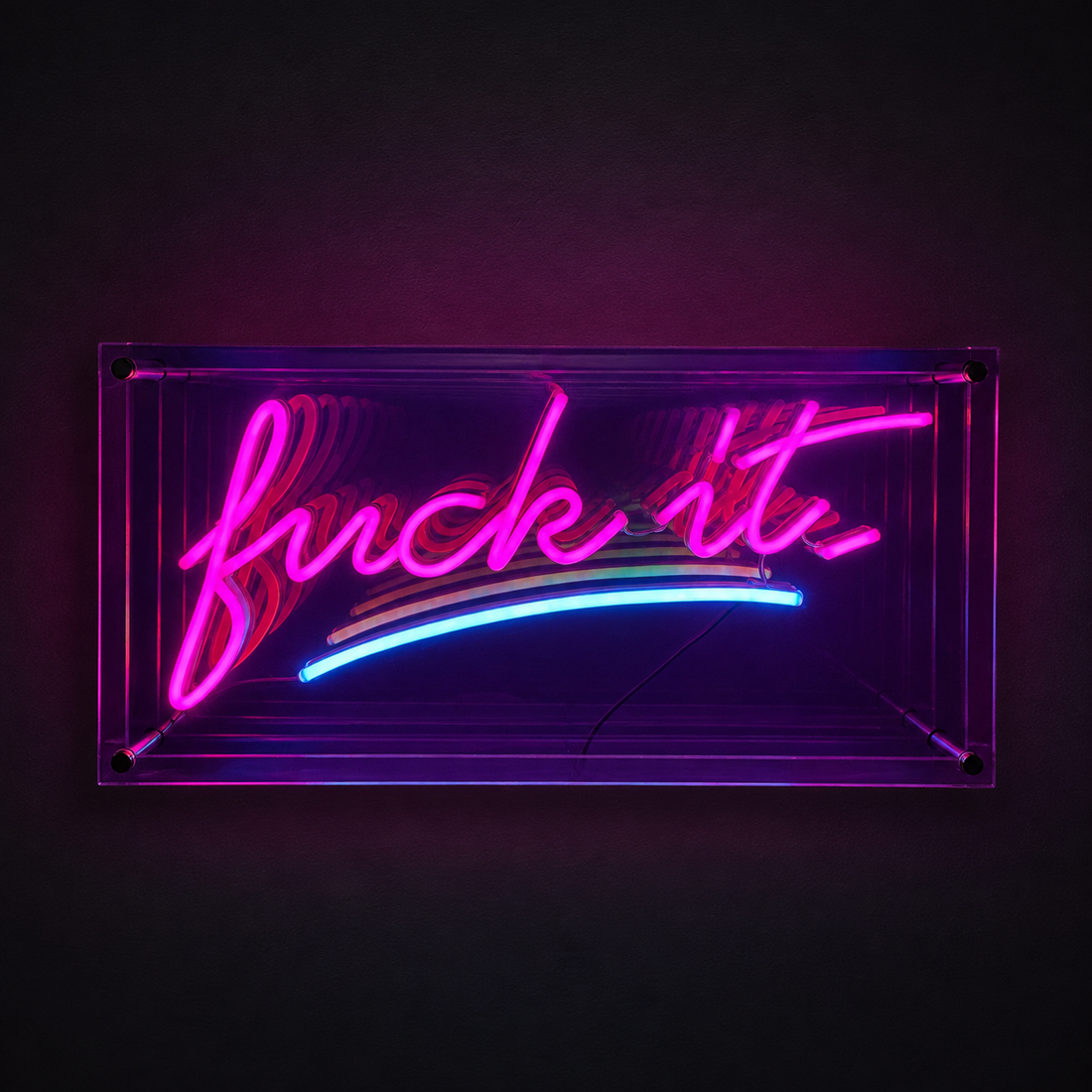 Fuck It infinity mirror LED neon sign glowing pink and blue on a charcoal wall