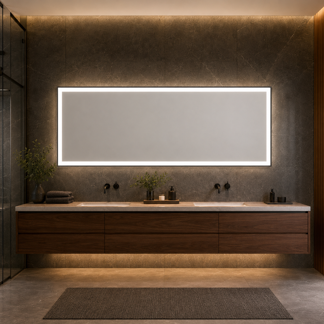 30 by 60 inch wide LED vanity mirror installed in a luxury bathroom