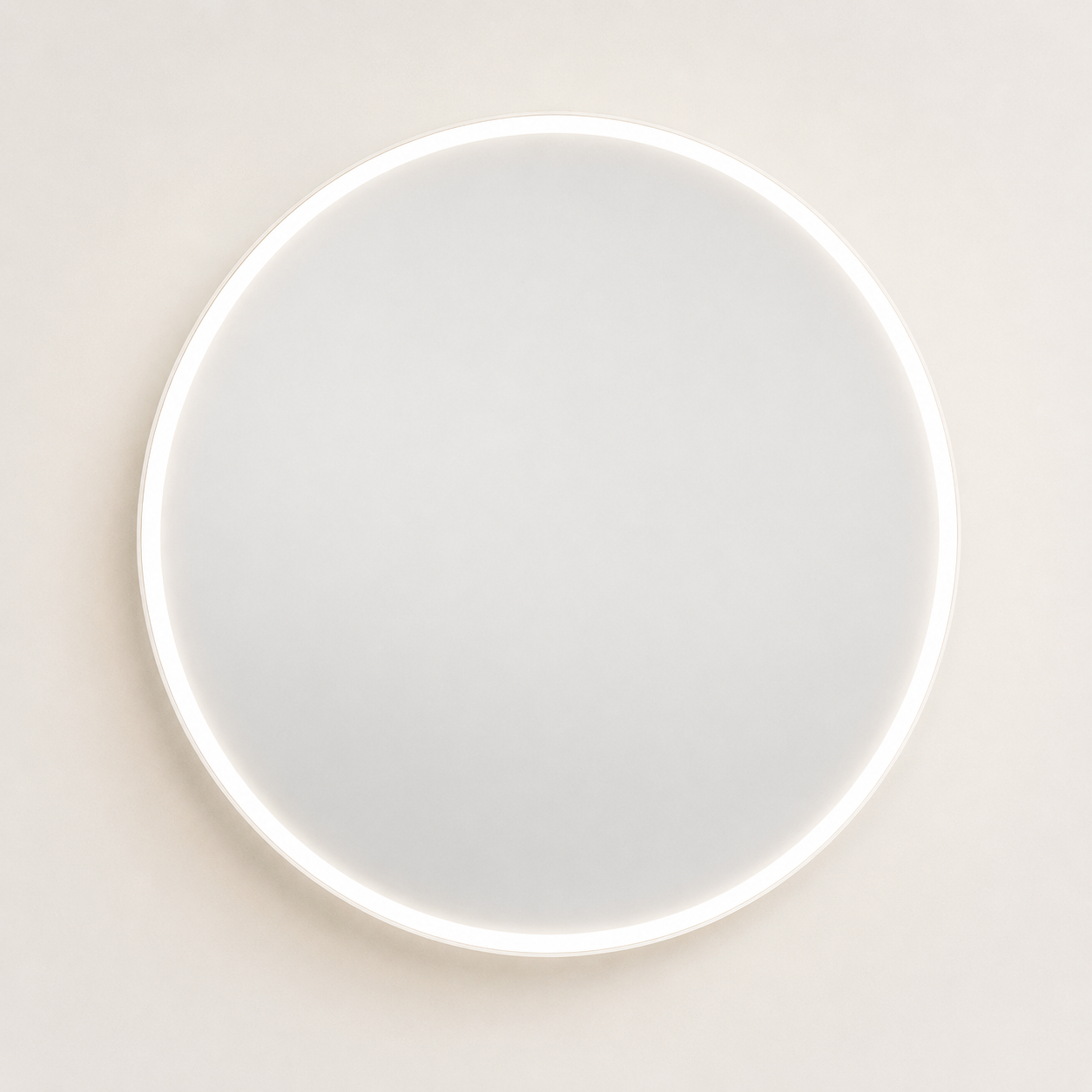 Round LED vanity mirror with illuminated border on a clean neutral wall