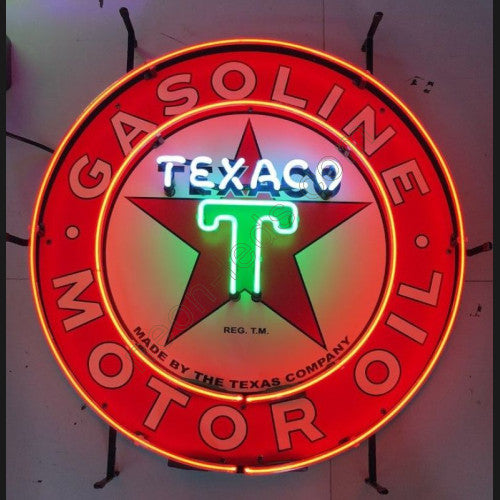 Neon sign of Texaco logo on a dark background